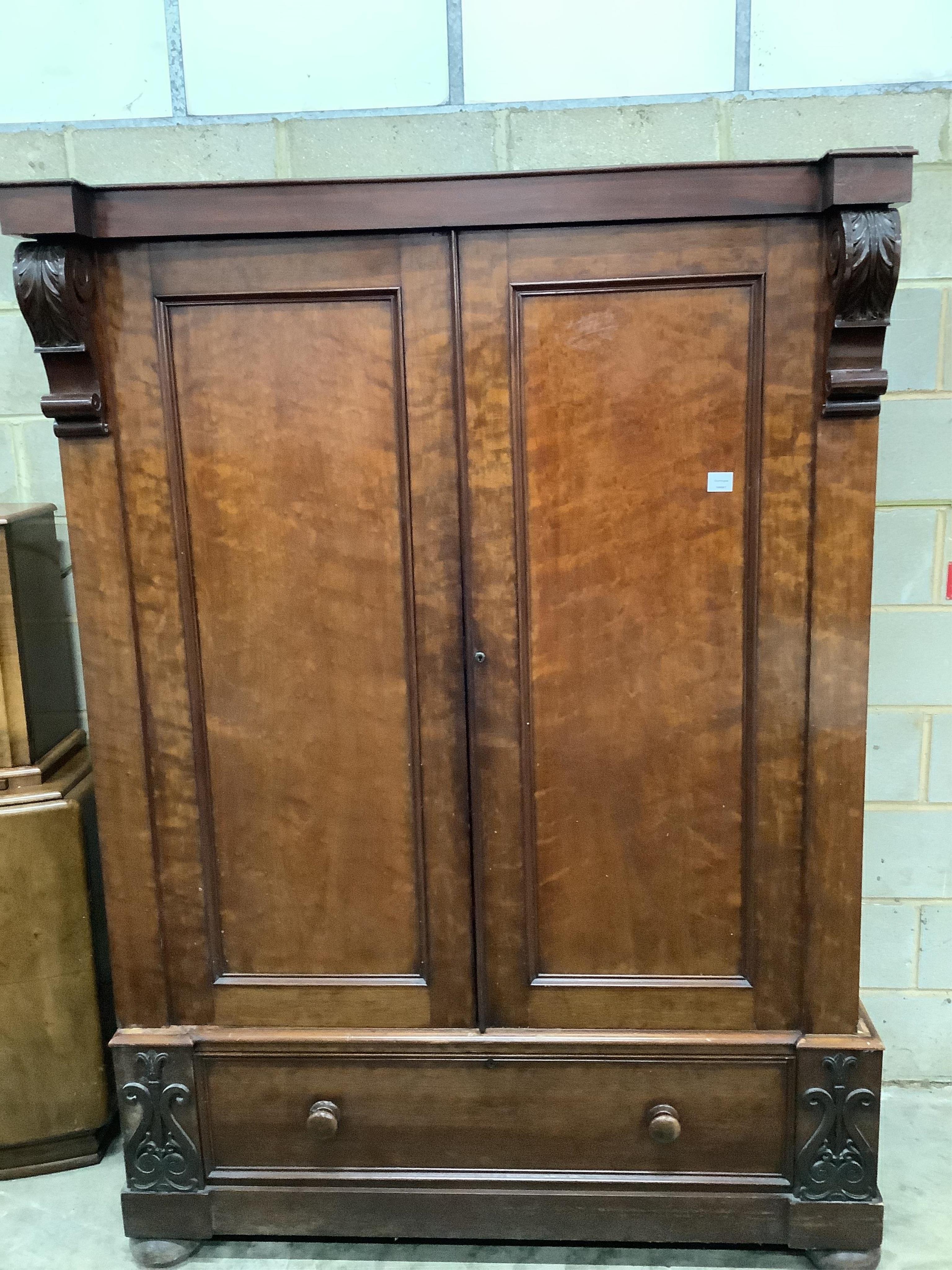 An early Victorian mahogany compactum wardrobe, width 140cm, depth 72cm, height 200cm. Condition - fair